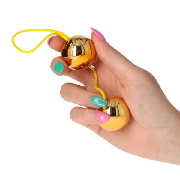 Palline stimolanti vaginali dorate