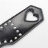 Paddle sculacciatore borchie cuore nero 31 cm Paddle sculacciatore borchie cuore nero 31 cm