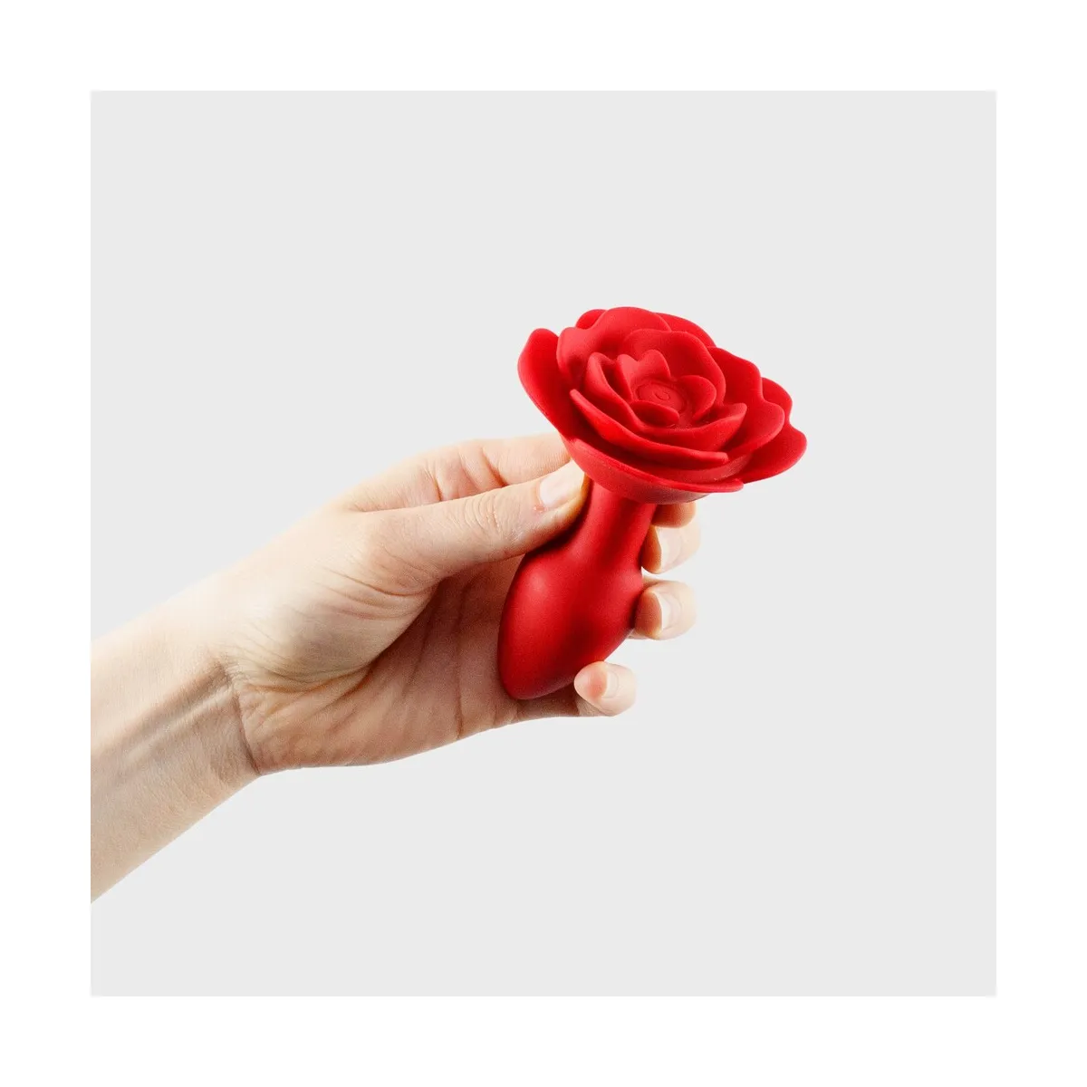 Buttplug vibrante forma rosa telecomandato